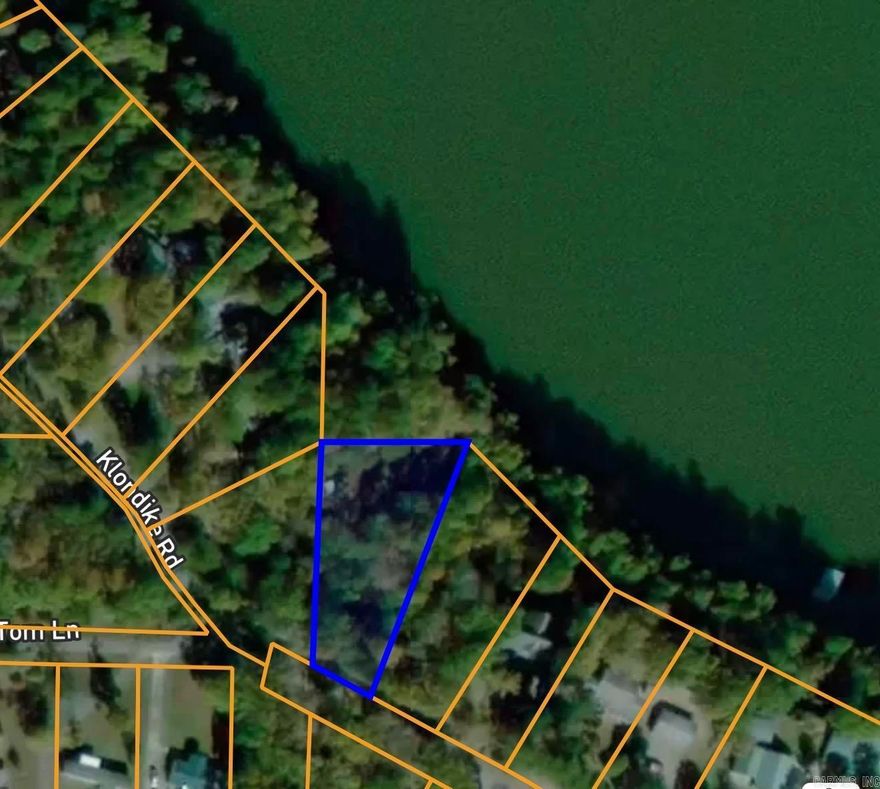 0.67 acre lakeview and lakefront lot located on a quiet street with beautiful views of the water. Property features a natural gully running through the center and a steep slope down to the shoreline. The upper portion of the lot offers the most suitable area for building. Priced to reflect terrain and topography, providing an excellent opportunity to own lake property at an affordable price.
