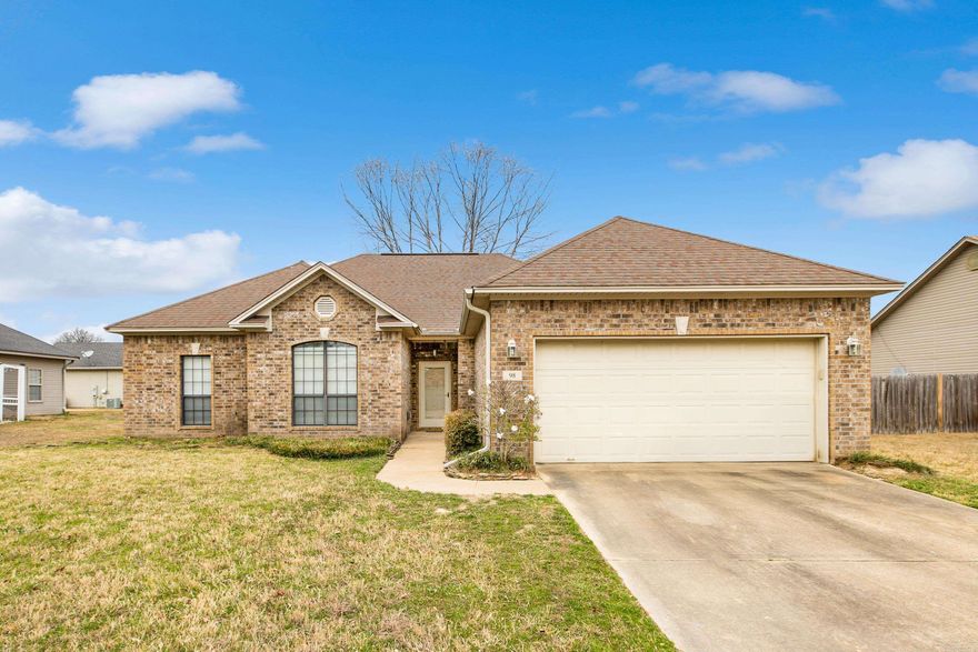 Charming one-level home in the Otter Creek area offering comfort, space, and convenience. This 3 bedroom, 2 bathroom home features approximately 1,850 square feet with a welcoming living area centered around a cozy wood-burning fireplace—perfect for relaxing evenings at home.  The kitchen offers an abundance of cabinet space along with a breakfast bar that opens to the main living area, making it ideal for everyday living and entertaining. A formal dining room provides additional space for gatherings, holiday meals, or even a home office if desired.  Step outside to enjoy the fully fenced backyard—perfect for pets, play, or outdoor entertaining. A two-car garage adds extra storage and everyday convenience.  Located in the established Otter Creek neighborhood area with easy access to both Interstate 30 and Interstate 430, commuting around the city is a breeze. You’ll also be just minutes from shopping, dining, and the popular Outlets of Little Rock. This home offers comfortable living in a convenient location close to everything the area has to offer.