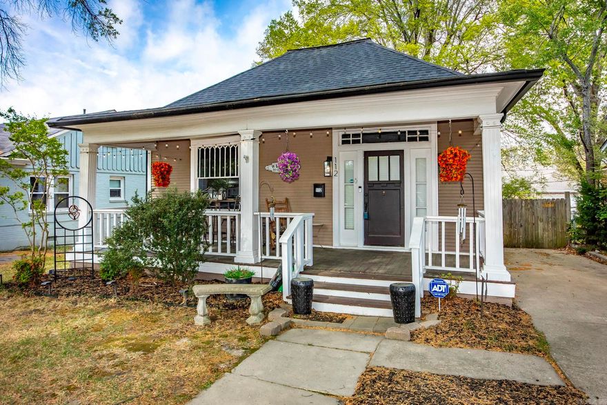 Beautiful 1900's home with loads of character and charm. Built to withstand all types of weather. Over-sized Family Room with beautiful hardwood floors. Kitchen has been updated and has a lot of storage. Primary Suite has a custom tile shower, with his and hers sinks. Shower is a walk in and the tub is a stand alone. Outside is amazing with a covered front porch, Large deck and patio is perfect for entertaining. A rare feature in this area is the large 2 car garage with a paved alley access. Large Oak trees in the back yard provide plenty of shade. Guest rooms are spacious and this home is just 5 minutes to UAMS. There is so much more to see, please call to take a tour.