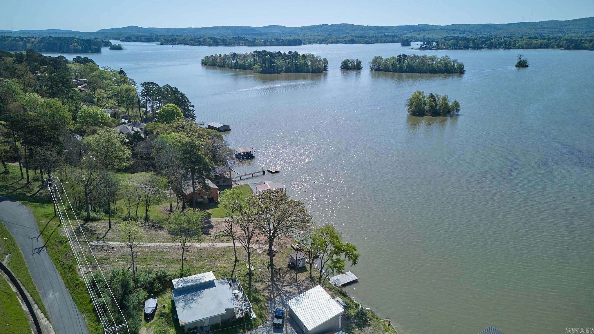 Build your LAKE HAMILTON dream home! Highly sought after 7 South Location on Lake Hamilton with views of Mt. Riante and Jack Mountain...Convenient to all that Hot Springs has to offer! Seller is Licensed Arkansas Realtor. Restrictions for one single family residence and set-backs to be determined. No vacation rentals.