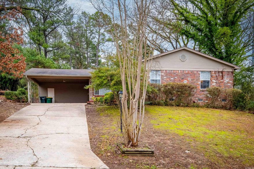 Move-in ready, 3-bedroom, 2-bathroom Midtown home offers a fantastic layout.  Enjoy remodeled kitchen featuring stainless steel appliances and quartz counters.  Hardwood and tile floors throughout most areas, neutral paint tones, and an abundance of natural light.  Conveniently located near shopping, dining, and hospitals, it also includes a two-car carport with storage.