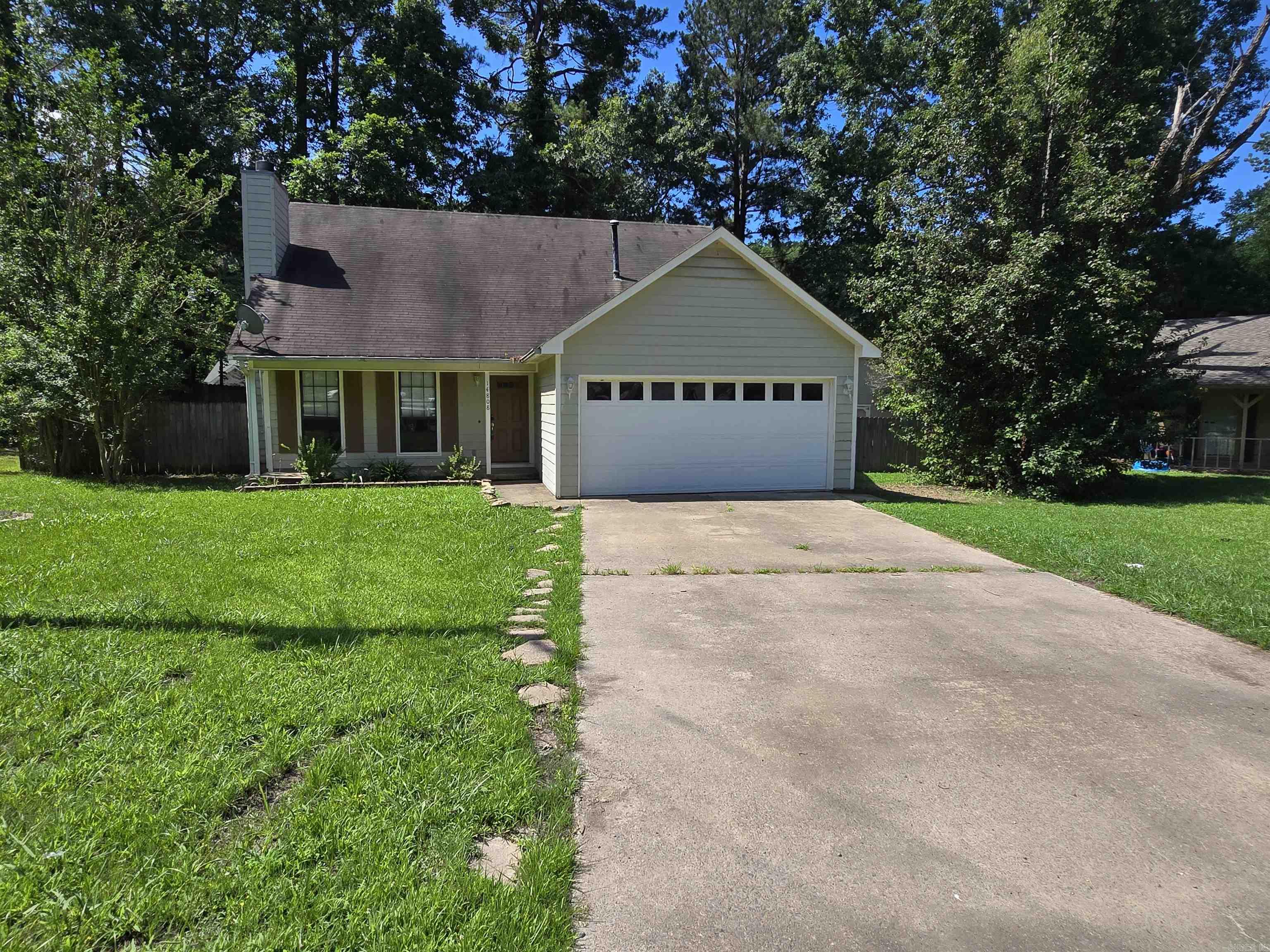 Come see this cute three bedroom two bath home on a cul-de-sac! This home features a large living room with gas logs. The master suite offers a large walk in closet and a master bath with a walk in shower. Upstairs you'll find two large bedrooms and a second bath. In the back yard you'll find a nice deck to relax on and a large building, approximately 20'x15', to store all your toys in!