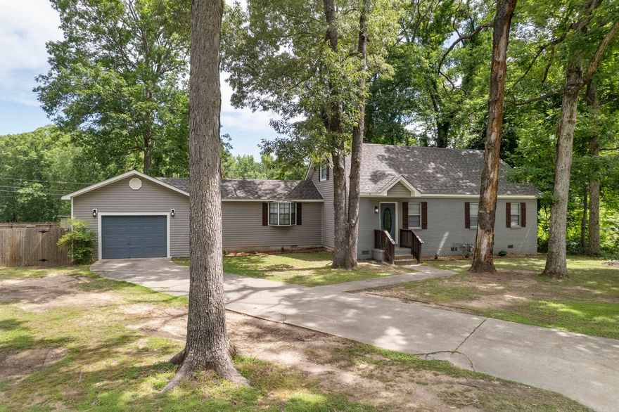 Welcome to your dream home in White Hall! This beautifully remodeled 4-bedroom, 3-bathroom single-family home offers the perfect blend of modern updates and country charm. Set on a spacious lot with a brand-new privacy fence and large backyard, this home provides peace and privacy while still being conveniently close to town. Inside, enjoy 1,731 square ft of cozy living space, fully renovated in 2023 with thoughtful updates throughout. Major improvements include a new roof & HVAC system in 2025, wired for generator, ensuring comfort & peace of mind for years to come.