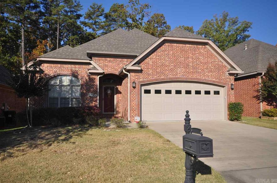 Wonderful 3 bedroom 2 bath patio home with open floor plan in WLR. Crown molding and hardwood floors. Master bedroom with lg walk in closet, double vanity, walk-in tile shower and whirlpool tub. Other 2 bedrooms split from master. Great storage above garage and off covered patio. Yard maintenance is included in the annual association fee.
