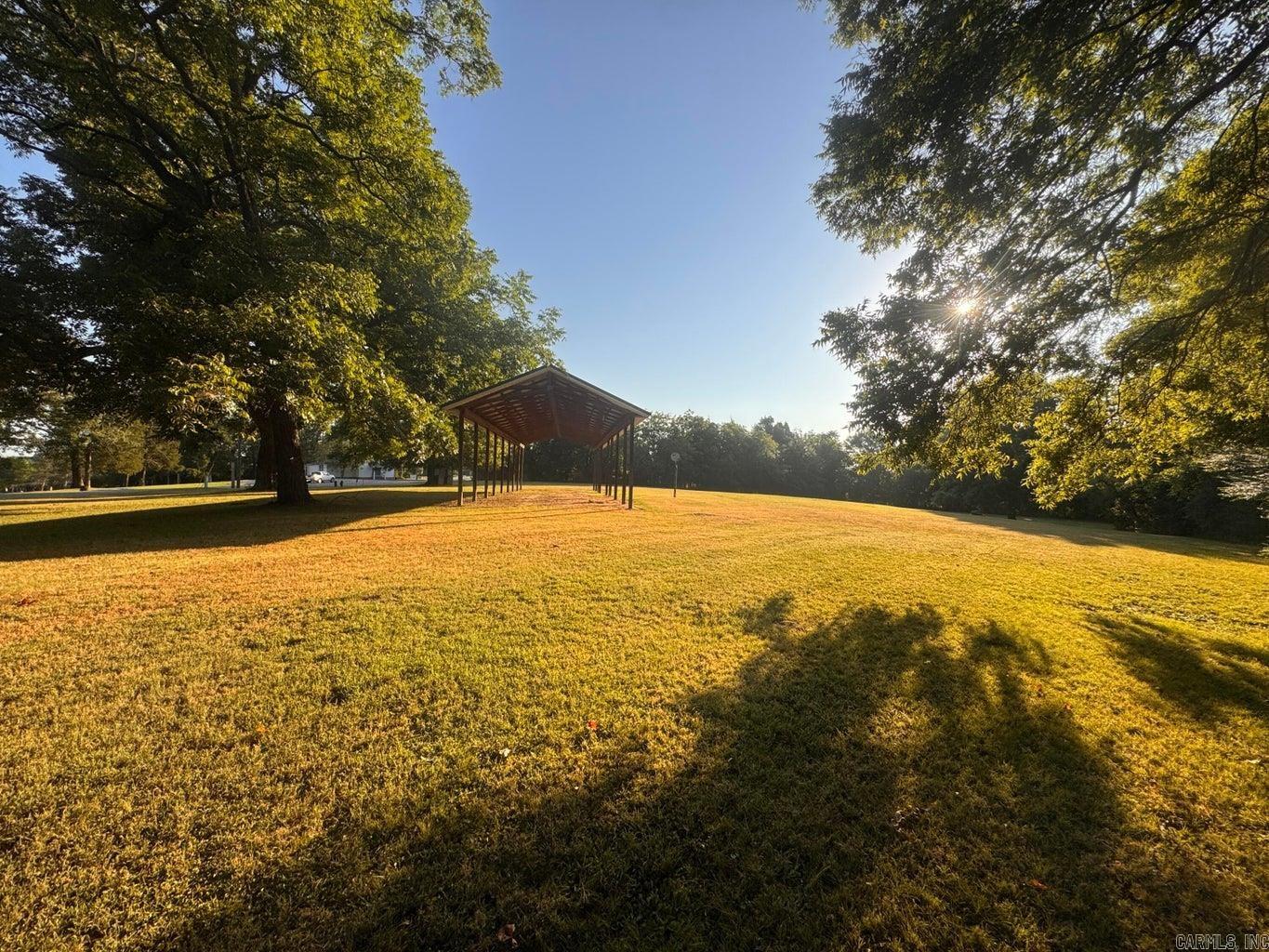 This perfectly manicured building site is difficult to find in Southside School District. With over 2 acres, there is already a septic, water meter and electric on the front. There are 2 driveways in place and an old well. The tree lines on the side and back could be opened up to a beautiful view of the surrounding area. The huge trees and peaceful setting make this a perfect place to start your future. A recent survey is on file.
