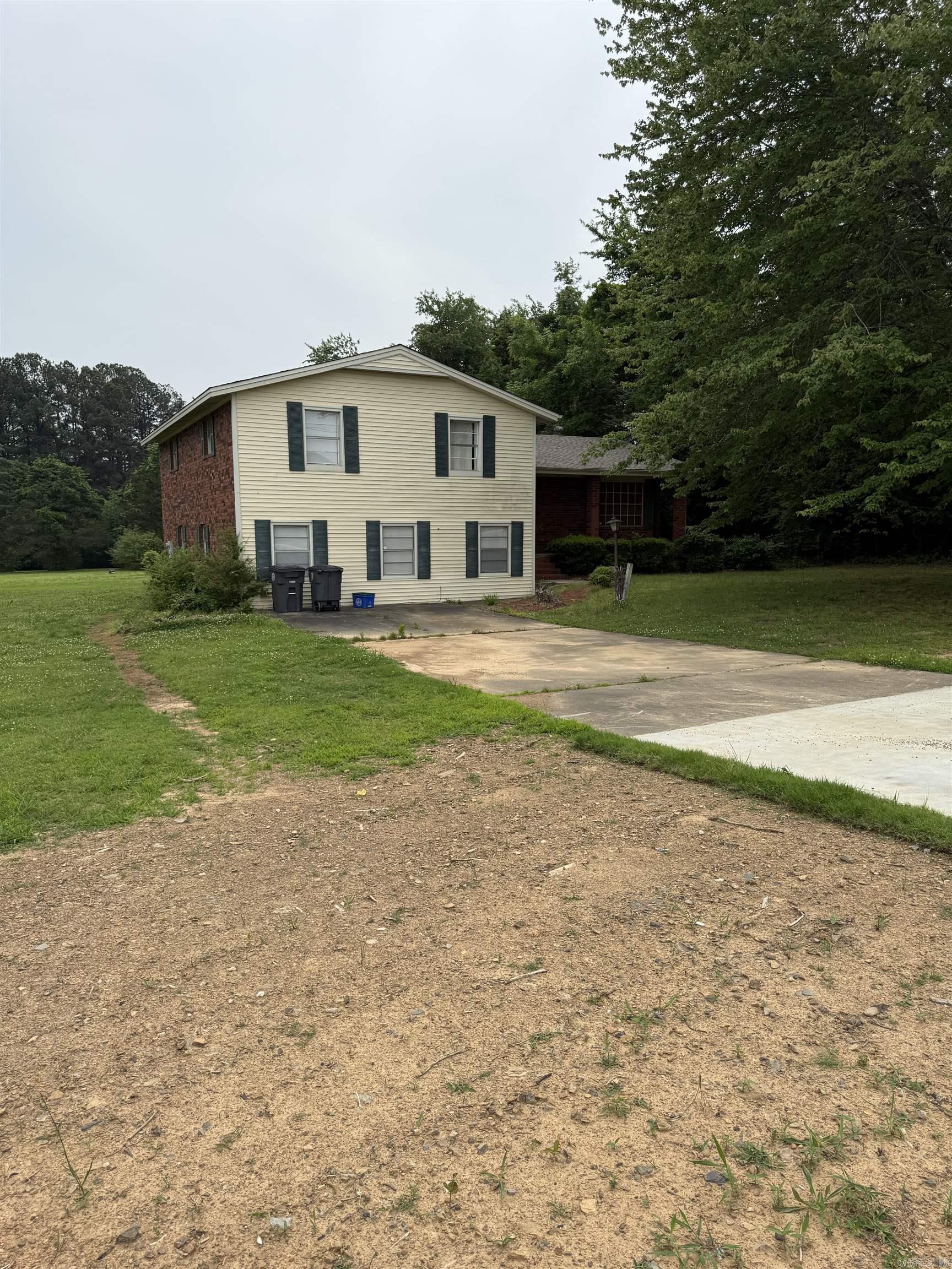 Due to unforeseen circumstances sellers must let this home go - creating an incredible opportunity for you to make it your own! This 4 bedroom, 2.5 bath home offers two generous living areas, a formal dining room, fireplace, office space. Lots of space inside and out. Recent updates include new roof (2023), two new HVAC units (2023) some new paint, some new carpet. Nestled on 1.5 acres offers the perfect blend of privacy and convenience. Close to everything you could need, restaurants, schools, shopping, country club and golf course.