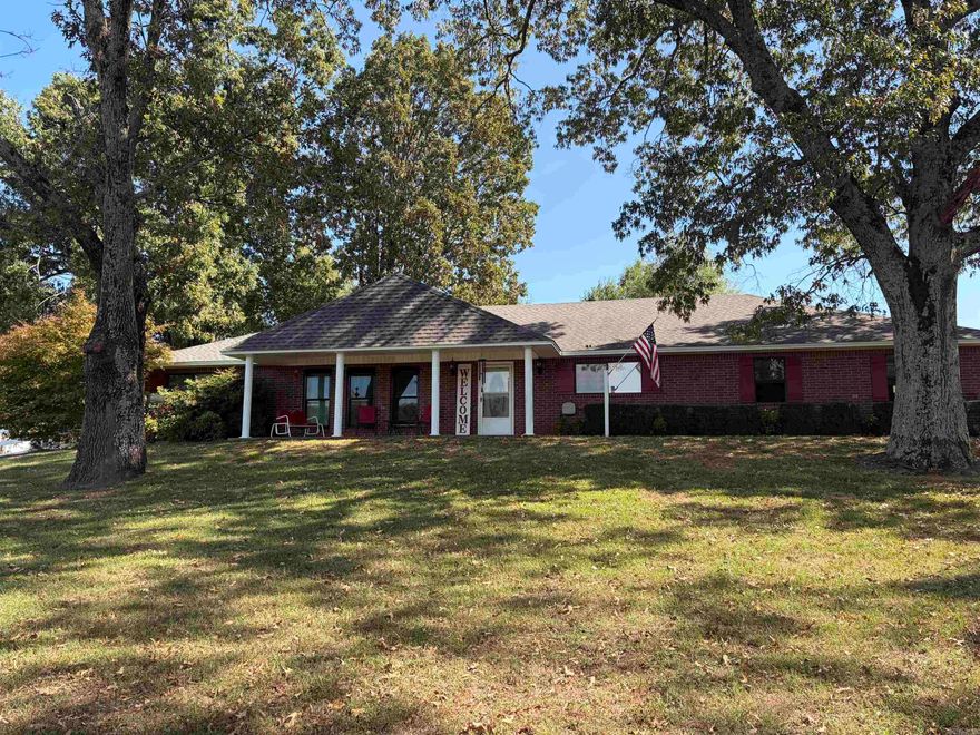Just Listed! This spacious country home offers over 2,000 square feet of living space on a rural 1-acre lot. Featuring 3 bedrooms & 2 full bathrooms—both with double vanities, one with a convenient step-in shower. You'll love the expansive, open-concept living room and the dedicated dining area off the kitchen, large enough to accommodate any size table. The kitchen also includes a breakfast bar, ample cabinet space. All-tile flooring—there’s zero carpet throughout the home. A generously sized laundry/utility room includes built-in closets for extra storage. Toward the back of the home, you'll find a versatile bonus room—perfect for home office, gym, playroom, or anything else you can imagine. The split floor plan offers added privacy, while outdoor living is maximized with a classic country-style front porch & a full-length covered back porch—ideal for relaxing or entertaining. The fenced backyard is great for pets, but you’ll still enjoy spacious front & back yard beyond the fence. Additional features:2-car garage*Brand new windows across the front for scenic views*Roof replaced 6 years ago*HVAC system only 3 years old This property truly offer the the best of country living.