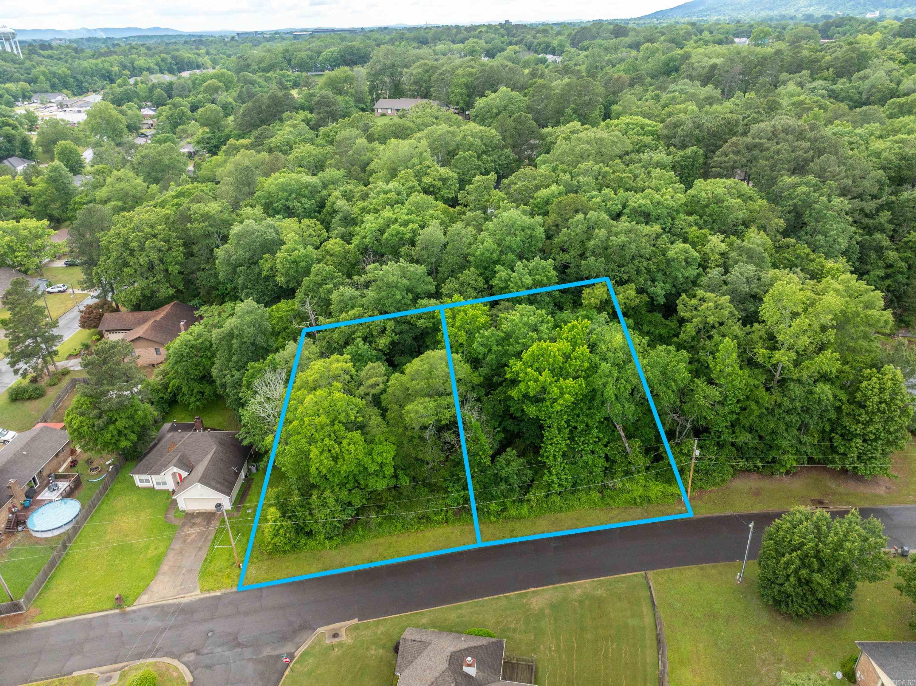 Prime Building Opportunity in this great Hot Springs location. This vacant lot is ready to build on, offering the ideal blend of convenience and potential. Infrastructure concerns? Not here! City water and sewer services are already available at the street, saving you significant time and expenses in the development process. This ready-to-build status means you can focus on designing. Hot Springs offers a unique blend of natural beauty, cultural attractions, and small-town charm that makes it a wonderful place to put down roots. From the historical bathhouses to the stunning natural landscapes, you'll never run out of things to explore and enjoy in this vibrant community. Don't miss this opportunity to create the perfect home in an ideal location with all the convenience of the city living close at hand.