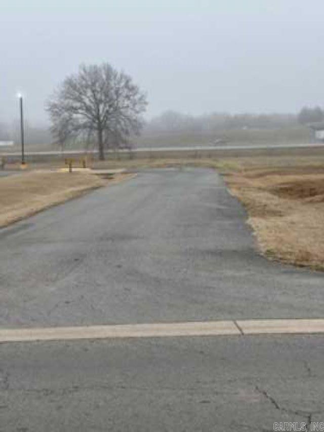 This prime property highly visible from both I-40 and Highway 9. This is one of the few tracts left this close to I-40 Exit 108 with this amount of available acreage. The property includes a strip of land adequate to build a driveway /street to connect to Bruce street. The property is zoned B-3 Highway Service, which allows for outside open display.