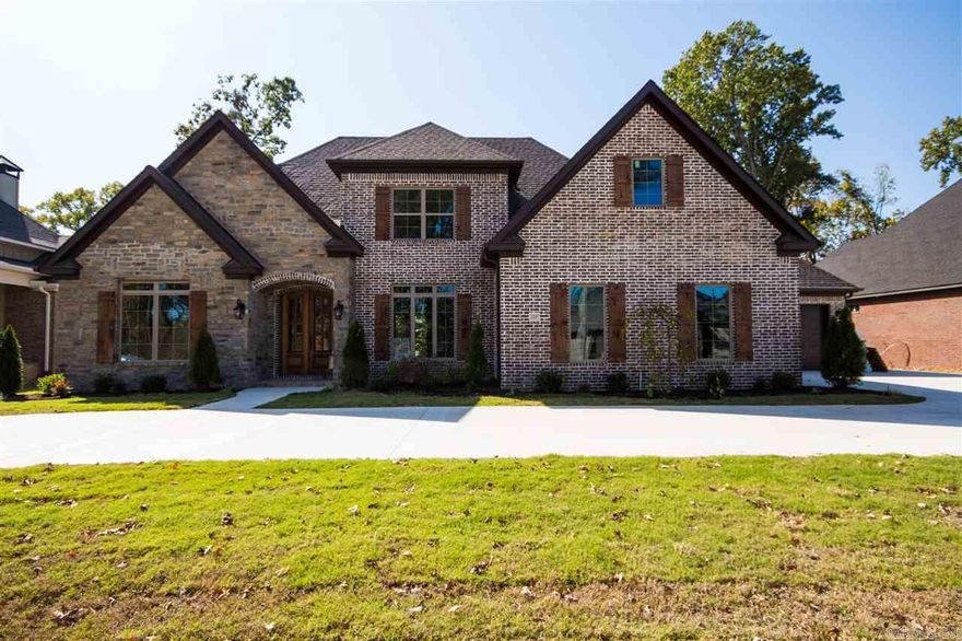 Stunning home with the master and 2 other bedrooms on the main level. The master features huge closet with built ins, granite and oversized walk in shower. Kitchen has double ovens, beautiful large granite island, and 5 burner gas stove. Covered porch with outdoor fireplace that overlooks green space. 2 bedrooms and a bath up, unfinished space could easily be converted into a fantastic bonus room. Built with great attention to detail!