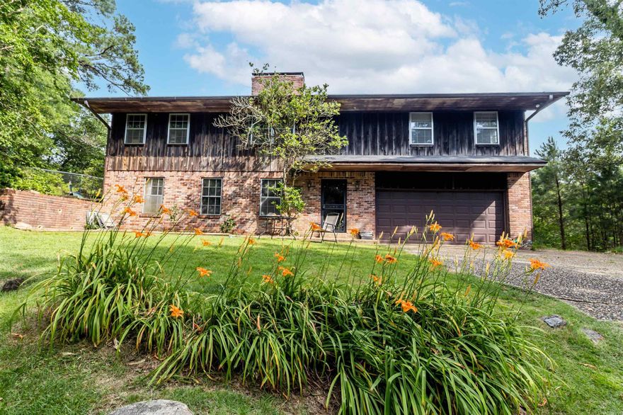 This spacious home sits on 1.48 beautiful and private acres, offering endless potential for investors or homeowners ready to make it their own. Being sold as-is, it's a perfect blank canvas for a custom renovation or flip. With plenty of space inside and out, this property is tucked away in a peaceful setting while still being just a short drive from the city. Don’t miss the chance to turn this into your next project or dream home!  **See agent remarks**