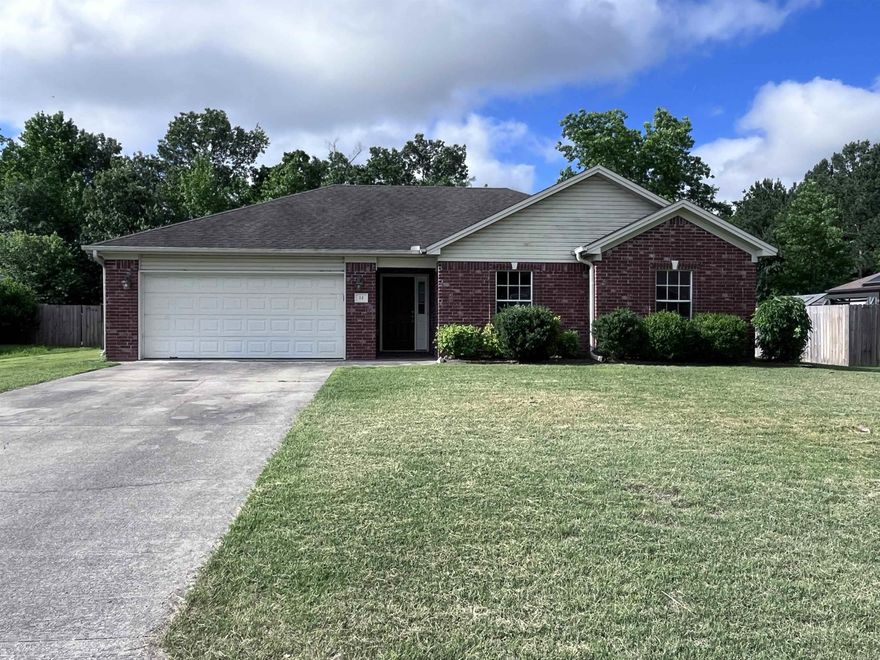 Spacious 3 bedroom, 2 bathroom brick house within walking distance to parks, schools, restaurants and shops! Laminate flooring throughout and freshly painted! Fireplace, dual vanity and walk-in closets in the master, laundry room, tons of storage, large privacy fenced backyard and much, much more! Refrigerator also included! This house is ready to be your home!