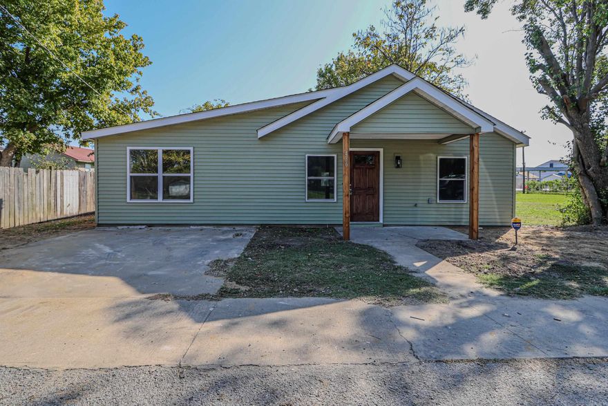 This home was totally rebuilt and everything is new and fresh ready for new owners. This cottage style cutie has all the charm of a bungalow with a large primary suite and ensuite bath, brand new luxury plank vinyl flooring and All new sheetrock, soothing paint colors, brand new cabinets in kitchen and appliances, two guest bedrooms share a double vanity bathroom, and the custom herringbone style butcher block work island will knock your socks off! Over 1400 sf of living space including a laundry room. Spend some leisure time in the extended back yard or have a cook out soon! Lot size 50X150 m/l.  $5000 Allowance for buyers to help with closing costs with an acceptable offer