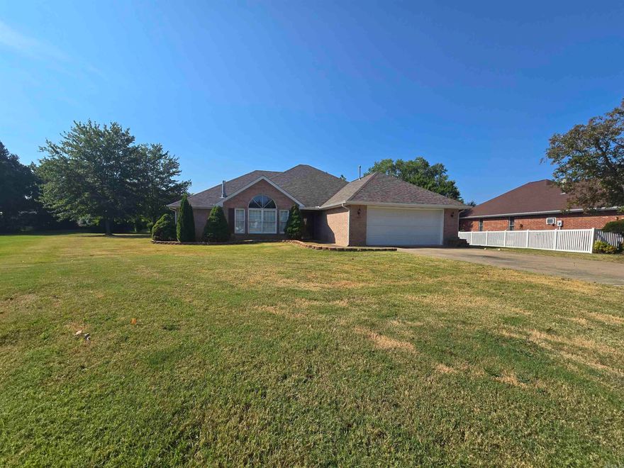 Peaceful living meets everyday convenience in this Chestnut Hills home! Tucked at the end of a quiet cul-de-sac, this all-brick, single-level beauty offers 3 bedrooms, 2 baths, and a smart split-bedroom design. The spacious primary suite includes a relaxing jetted tub, walk-in shower, and oversized closet. A bright kitchen with granite countertops and maple cabinetry opens to generous dining and living spaces with vaulted ceilings and a cozy gas-log fireplace. Sunlight fills the heated and cooled sunroom, perfect for morning coffee or quiet evenings, while the back patio overlooks a beautifully landscaped yard with flowering trees and perennials. A 2-car garage provides convenience and storage, and gutters with leaf guards help make upkeep simple. Thoughtfully cared for and move-in ready, this property is just minutes from shopping, dining, medical services, and Norfork Lake, blending comfort, charm, and location in one perfect package!sitting on 1/4 AC M/L for $350,000.