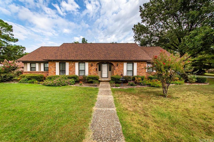 This is a very beautiful home sitting on a Corner Lot and 1/2.  It features beautifully remodeled great room, study, 2 beds down and 3 beds up, separate dining and fully loaded kitchen with breakfast bar.  Laundry and spacious sunroom give this home  all the extras.  Outside you have an inground pool with patio surround.  Off the pool is a shop with bathroom and electricity.  Shop has separate driveway for easy access.  Call 501-842-3928