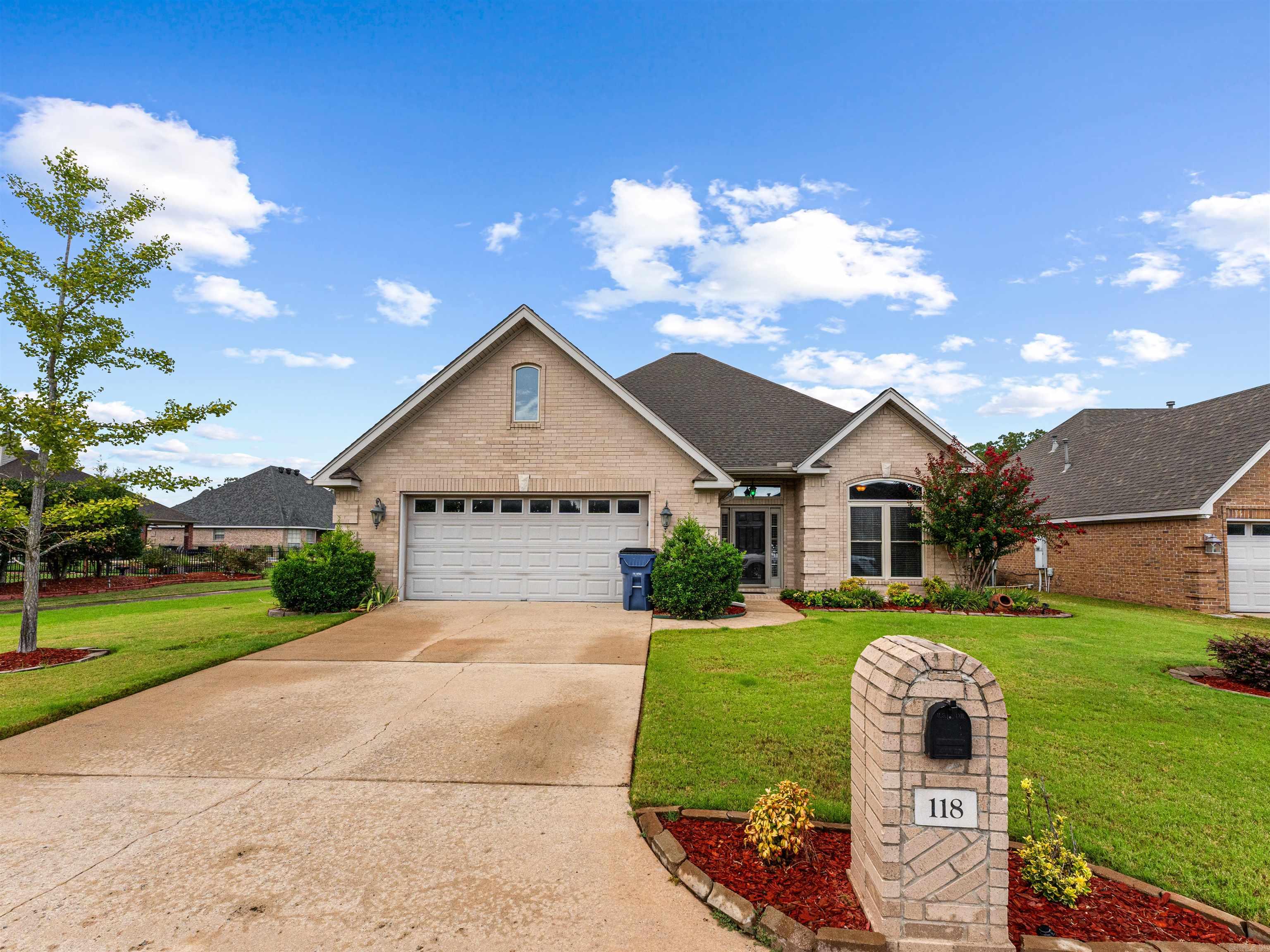 Beautiful inside and out! One level 3 bedroom 2 bath + office/study, seperate dining, eat-in kitchen with island open to great room w/fireplace, large primary suite with very large closet, master bath w/double vanities and whirlpool, beautiful crown molding throughout, new windows - 2016 with transferrable warranty, carpet, tile and wood floors, covered patio and professionally landscaped. Fish in the pond right out back. House is located in the Country Club of Arkansas subdivision so get your golf clubs ready!