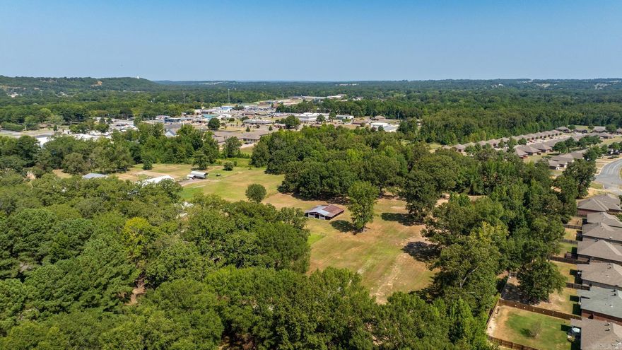 Rare find—6.11 acres inside the Greenbrier city limits! This beautiful property offers a cleared area ready for your dream home, along with a pond for added charm. Enjoy the convenience of city water, sewer, and Entergy power at the road, plus fiber optic internet for high-speed connectivity. A wooded area provides natural privacy while still being close to all the amenities of town. Whether you’re looking to build now or secure land for the future, this property offers the perfect blend of space, convenience, and tranquility. Don’t miss this opportunity—call today to schedule your private showing!