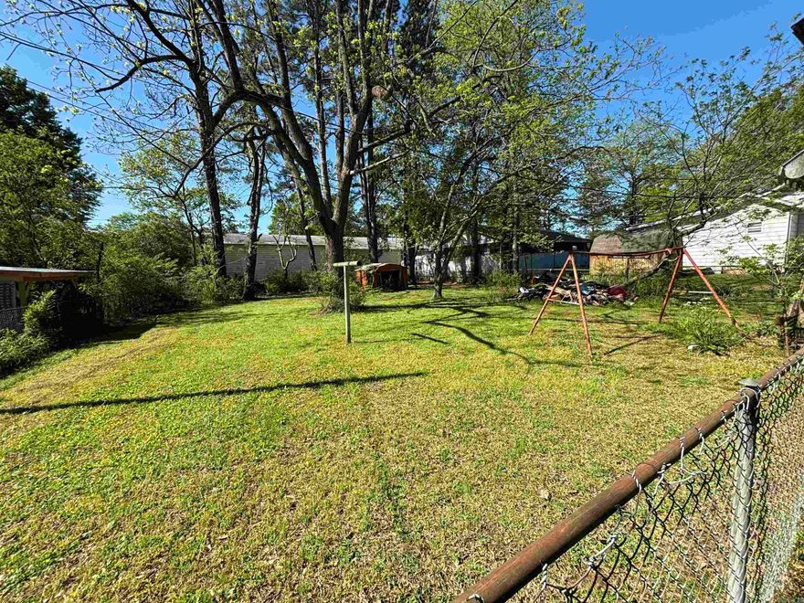 Nice city lot in town*convenient to schools*approximately 75x150 in size is a huge lot in town*house has no value-needs torn down*CAN HAVE A MOBILE HOME ON THIS LOT