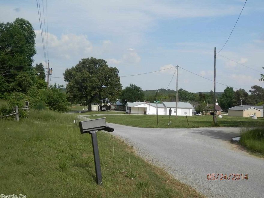 Mature trees abound on 5.64 acres in Lawrence County.  Perfect setting for quiet, rural living.