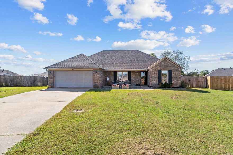 Step inside this beautifully maintained 3 bedroom, 2 bath home.  The interior offers a perfect blend of comfort and sophistication with tile in wet areas and luxury vinyl plank flooring, combining durability and easy maintenance.  The kitchen has stainless steel appliances, ample cabinet space.