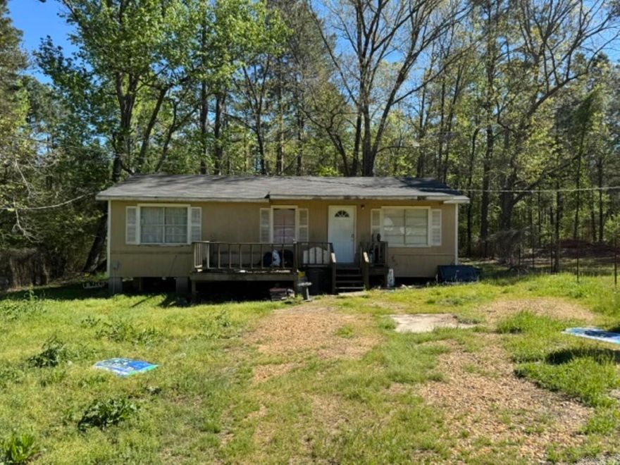 Experience peaceful country living on this spacious 2-acre property, conveniently located near White Oak Lake. Built in 1984, this charming home features 3 bedrooms and 1 bathroom, equipped with central heating and air conditioning for year-round comfort. Whether you're a first-time homebuyer or searching for the perfect hunting or fishing retreat, this property is an excellent choice. Enjoy easy access to both White Oak Lake and Bragg Lake, renowned for their outstanding fishing opportunities. Don’t miss your chance to own a cozy home in a prime recreational area.