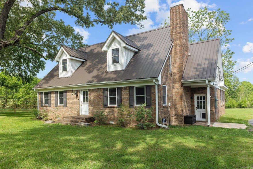 What's not to love about this one-of-a-kind property?  Sitting on over 8 acres, this property includes a beautifully updated home with pond and lake access and buried invisible fence for dogs that spans ~1.5 acres.  The home features an open living/kitchen/dining area with a peaceful and private view of the pond.  The laundry nook offers extra storage, countertop space and sink, creating a cozy area to enjoy morning coffee.  The primary bedroom, office with built-in book shelves (could be used as 4th bedroom) and one full bathroom are located on the main level.  The second level includes a loft with balcony access, two spacious bedrooms and one full bathroom.  Agents, see remarks.