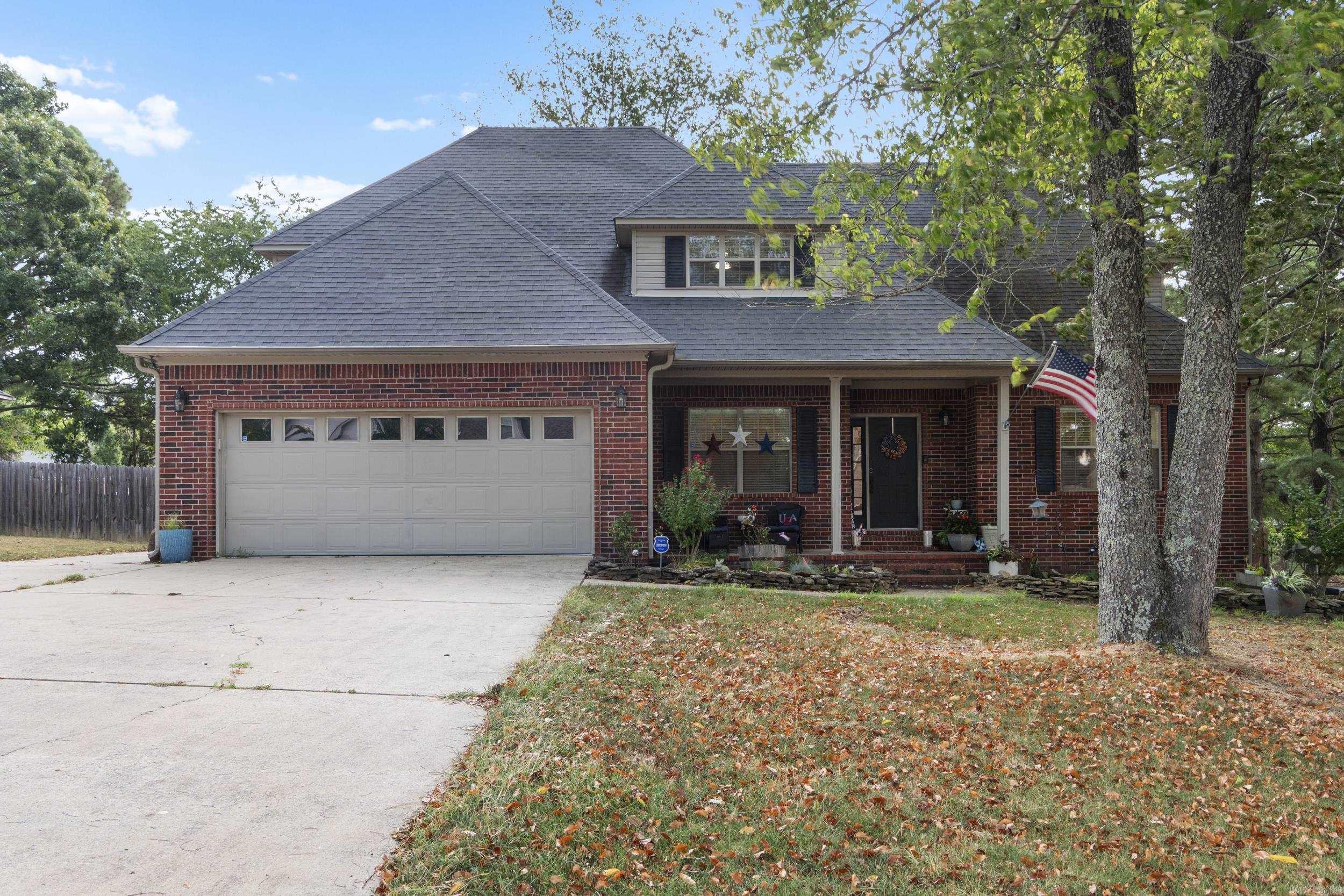 Beautiful home with ALL the charm in the heart of Greenbrier! This homes features a large, fenced yard with plenty of mature shade trees, a fire pit, and a sizable covered porch! The interior boast spacious rooms, large closets, 9' ceilings, natural wood floors, and a HUGE master bedroom on the 1st floor. Kitchen is complete with double-wall ovens, quartz counters, and natural gas. There is a massive bonus/game upstairs big enough for the entire family. Matching shop has access from the driveway and is wired for 110V. Call our text to schedule your own private tour.