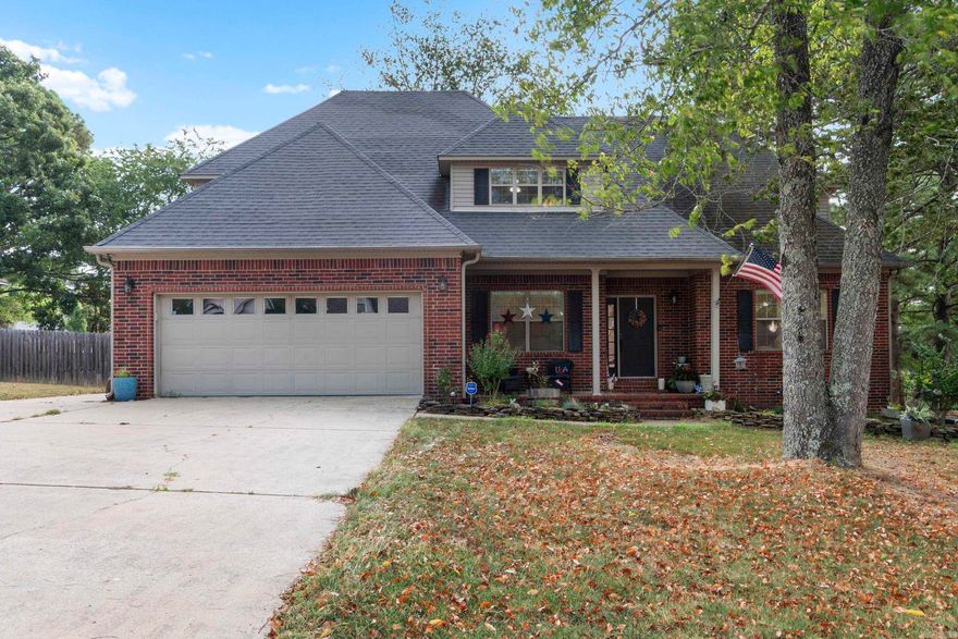 Beautiful home with ALL the charm in the heart of Greenbrier! This homes features a large, fenced yard with plenty of mature shade trees, a fire pit,  and a sizable covered porch! The interior boast spacious rooms, large closets, 9' ceilings, natural wood floors, and a HUGE master bedroom on the 1st floor. Kitchen is complete with double-wall ovens, quartz counters, and natural gas. There is a massive bonus/game upstairs big enough for the entire family. Matching shop has access from the driveway and is wired for 110V. Call our text to schedule your own private tour.