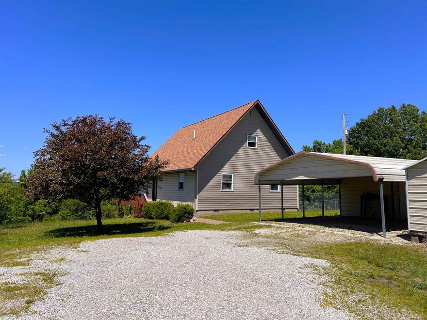 Nestled in the beautiful Ozarks of Stone County, this 3BR/2.5BA home on approximately 10 acres offers peaceful mountain views, privacy, and plenty of potential. With good bones and a functional layout featuring two full baths downstairs plus a spacious upstairs area with half bath, this property is ready for someone to bring it back to life with a little elbow grease and personal touch.  Enjoy year-round scenery from the screened-in back porch overlooking the mountains. The property also features a fenced side yard, fruit trees, carport, storage building, and room to enjoy quiet country living. Refrigerator, washer, dryer, portable dishwasher, and microwave all convey.  Some cosmetic updates and upstairs flooring are needed, and pricing reflects the opportunity to make this Ozark property your own. Conveniently located near Mountain View while still offering the peaceful country feel buyers love. Call today to schedule your private showing and see the potential this property has to offer.