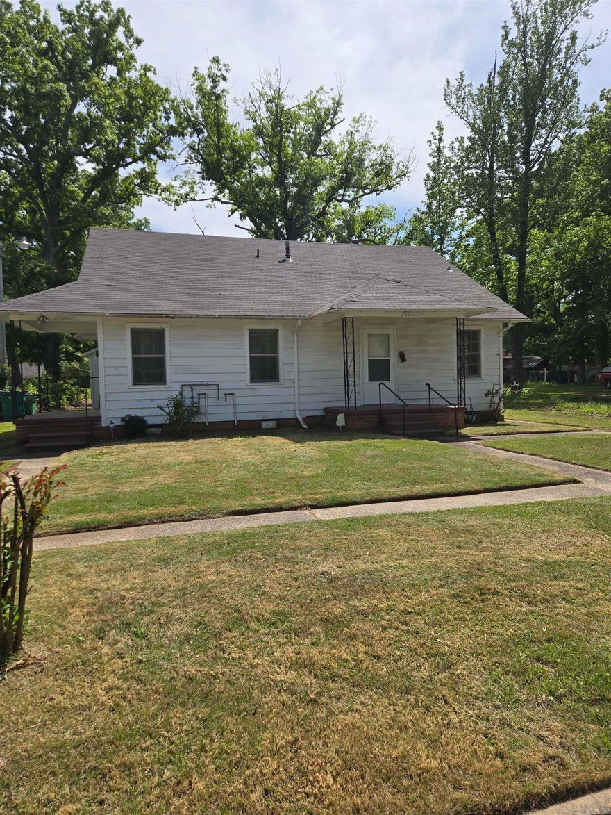 Unlock the potential of this side-by-side duplex! Featuring a 3-bedroom, 1.5-bath unit and a 1-bedroom, 1-bath unit, this property offers versatility for investors or homeowners alike. The expansive backyard provides a blank canvas for outdoor living or added amenities. While some enhancements are needed, this is a prime opportunity to customize, renovate, and build equity.