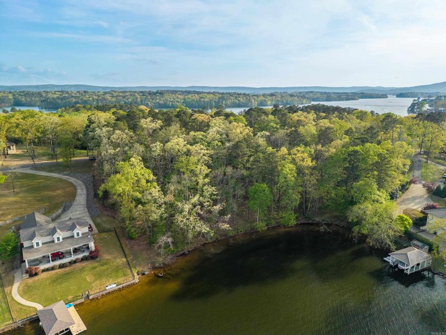 Lake life starts here! This incredible 0.82-acre lot on Lake Hamilton offers approximately 105 feet of lake frontage, giving you the perfectsetting to build your custom home or create the ultimate waterfront escape—complete with space for your own private boat dock.Situated in the desirable Lakeside School District, you’ll enjoy the best of both worlds—peaceful lake views with quick access to town,restaurants, shopping, and more. Looking for an investment opportunity? This property also has great potential for Airbnb or short-termrentals, making it a smart option for those wanting to enjoy the lake while generating income. Don’t miss your chance to own a slice ofLake Hamilton!
