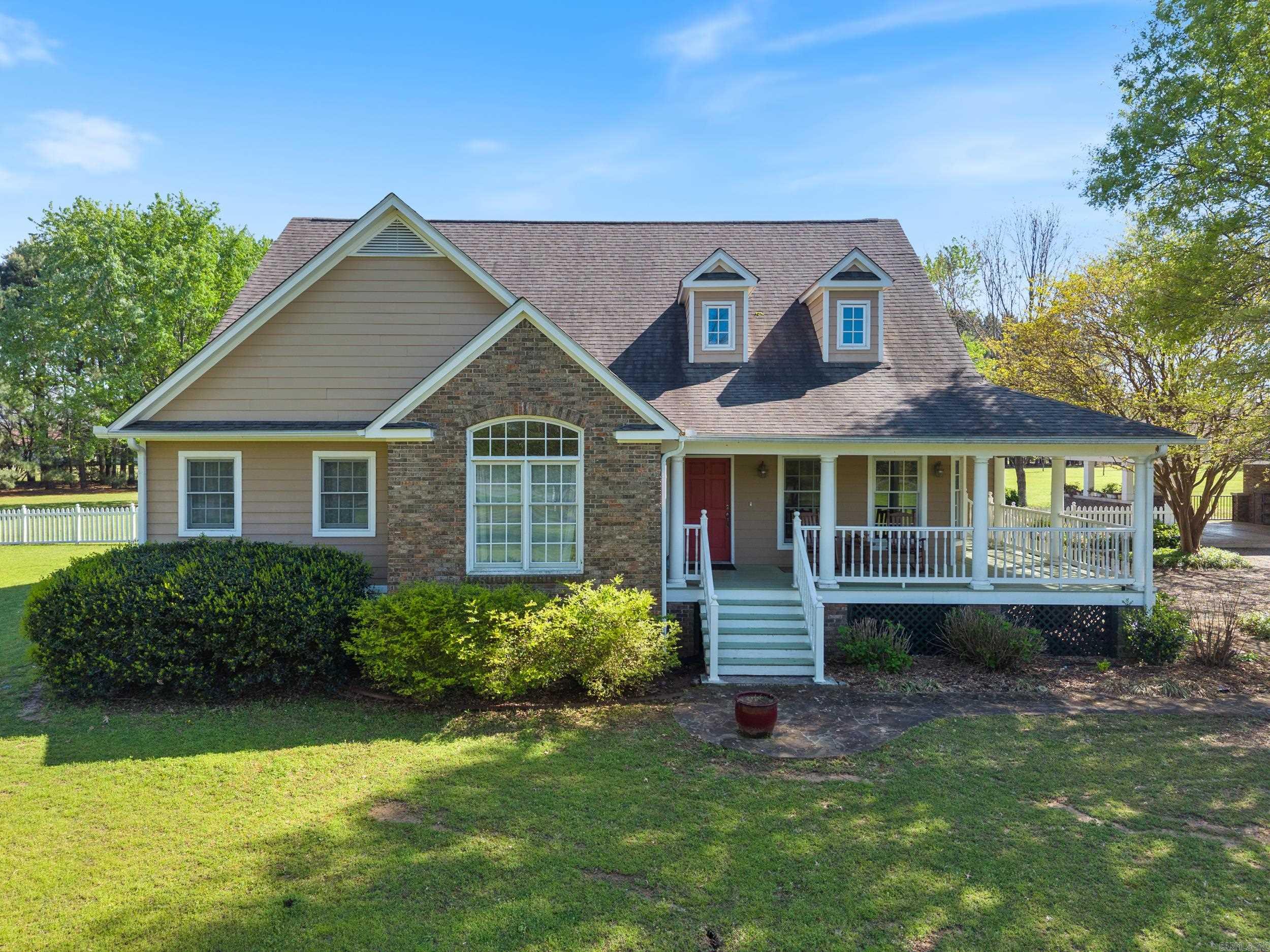 Deal of the week - only $143 per square foot! Just in time for spring and summer entertaining. Relax and enjoy this custom home with inground swimming pool (new liner), fully landscaped and fenced back yard. Sip some summer lemonade under the mature oak, maple, pecan and pine trees. Plenty of parking in a double carport and double garage or shop space. Covered porch on front and screened back porch facing pool. Downstairs features a large living room, separate dining, kitchen with breakfast bar, three bedrooms, and two and a half baths. The half bath is a FEMA designed storm shelter. The home is wired with a transfer switch to power the necessities in the event of a power outage. Upstairs (added in 2020) has a large bonus room and two additional bedrooms or use one as a home office. Loads of storage and closet space. Come see it today, less than 30 minutes from downtown Little Rock and NLR. Schedule your showing today!