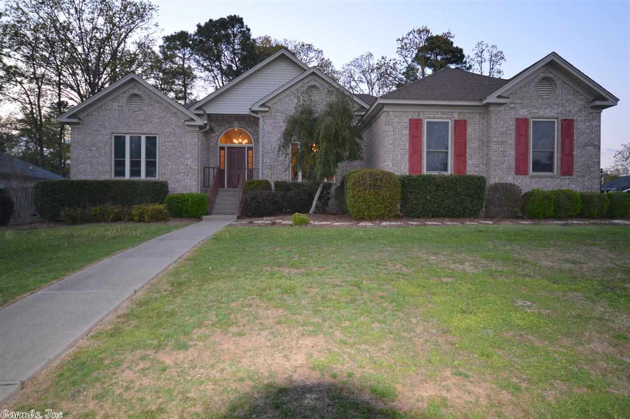 Move in ready! This 4 BR, 2 BA, brick home sits on a great corner with a 2 vehicle garage. Inside has lots of space with a beautiful great room, living room/dining combo, an eat in kitchen w/a breakfast bar, 4 large bedrooms with master bedroom apart, and large walk-in closets. Updates include lighting, carpet in all bedrooms, hardwood floors & tile, H&A, custom blinds, bathrooms, and roof was replaced in 2009.