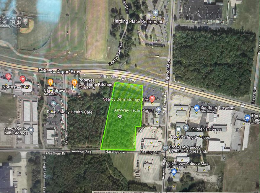 PRIME 5.6 acres of developmental commercial property, frontage, very high traffic count. Located next to Beebe Capps Professional Bldg and Hometown Orthodontics and directly across the highway from Harding University