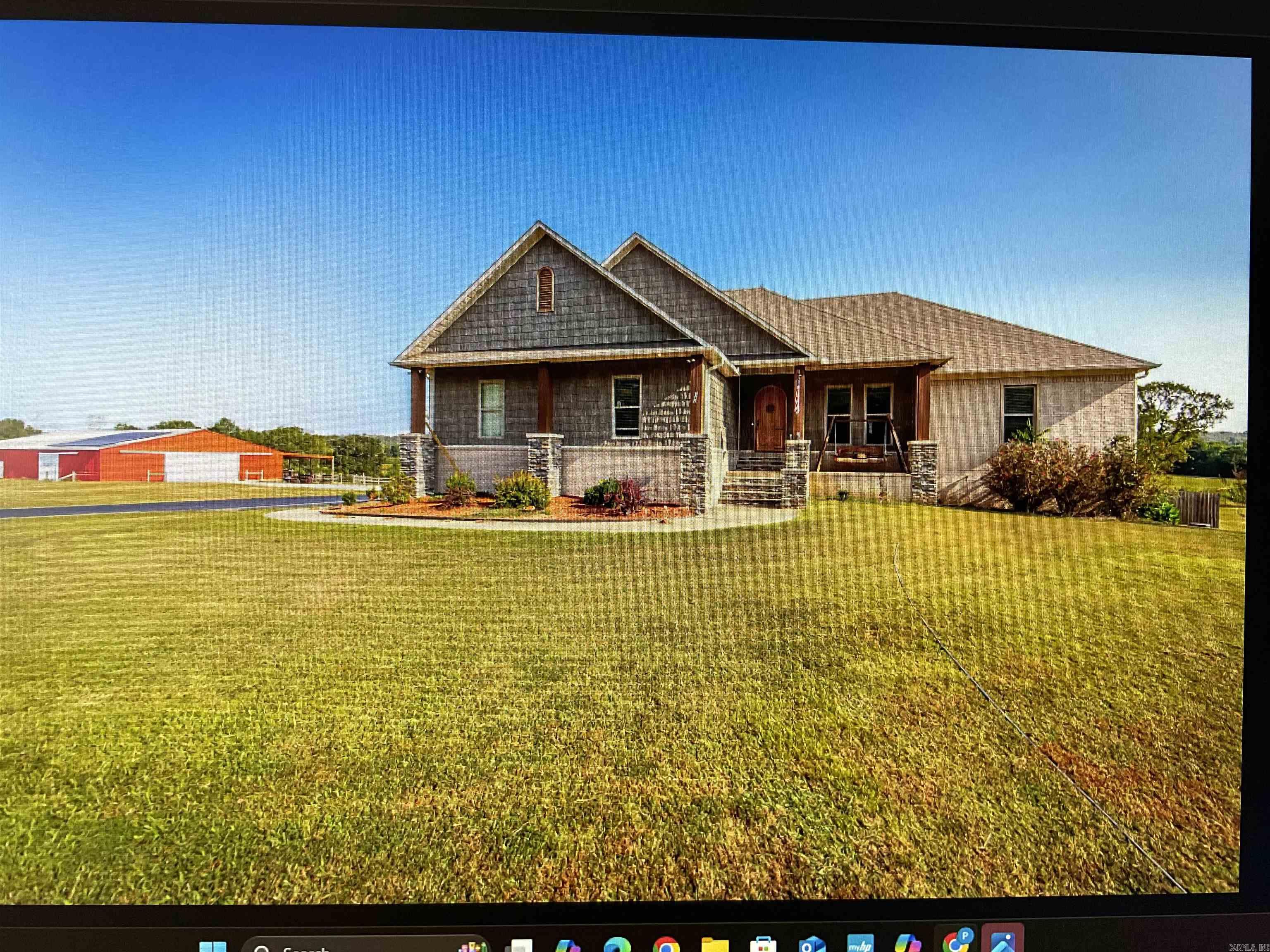 Seller Motivated !!! Solar FOR THE ENTIRE HOME AND POOL . Very large and wonderful home has 2 FULL kitchens . 3 Bedrooms on the main level with a very spacious kitchen Double oven was replaced in 2024 New dishwasher in 2025 New under counter ice Maker in 2025 Elevator battery was just replaced in 2024 ,2 car garage on main level with a built in ramp . Downstairs there is a 1 car garage stair access Full Kitchen Full Bathroom and a separate room could be a bedroom or office with garage access living area and storage area . Oven and dishwasher were both replaced in 2023 downstairs is hardly ever used . WASHER AND DRYER DO NOT CONVEY , FRIDGE AND FREEZER DO NOT CONVEY Outside you have awesome oversized pool with 3 covered areas for entertaining .The pump room also has a half bath so changing is easier after a refreshing swim . the barn is huge 50X100 also has a shop in it . The home is equipped with an ON DEMAND HOT WATER HEATER .