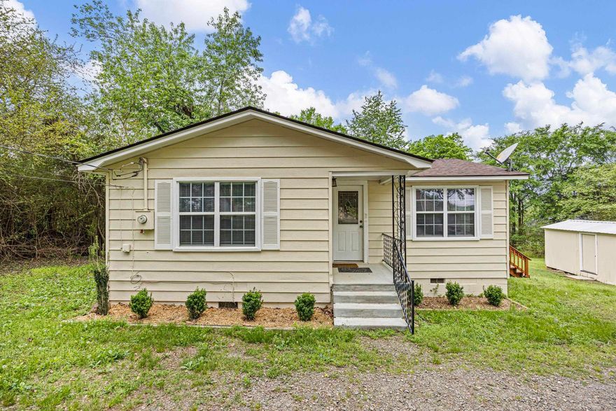 Welcome to this beautifully refreshed 2-bedroom, 1-bath home, perfect for those seeking comfort and a quiet setting. Relax with your morning coffee on the deck and take in the peaceful atmosphere. The generous yard offers plenty of space to garden, entertain, or design your own outdoor oasis. Conveniently located near town, you’ll have quick access to shopping and dining while still enjoying a more private feel. Recent updates include a new roof on the house and the shed, updated kitchen flooring, and fresh paint inside and out.