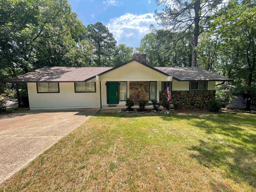 DARLING COTTAGE  Totally updated in 2019.  Plus New stainless refrigerator 2022.  New Washer 2021.  New stainless dishwasher 2021.  New HVAC 2021.  Luxury Vinyl plank flooring throughout. Fully furnished & TURN KEY. Open Living-Dining-Kitchen.  Fireplace.  Seller is using as a short-term rental, and it sleeps up to 10.  A large family room has bunk beds (BR #3) and other furniture to accommodate several. Walk-in closet.   Updated bathrooms, and the kitchen, have granite counter tops. Master bath has step in shower.  Sizable laundry room & storage room.  All in soothing gray & white colors.  Nice rear deck to enjoy relaxing or outdoor grilling.  Extra parking on driveway at the back from side road.  Large corner lot, plus 2 adjoining lots included (not replatted).  Everything is in like-new condition.  Currently a Short-term rental, and cannot be shown when Guests are using the housel  Appointment only.  Agent Remarks