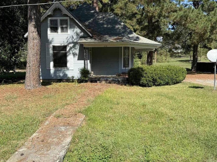 Folk Victorian 3-Bedroom Home with Extra Lot in DeValls Bluff  Step back in time with this charming Folk Victorian 3-bedroom, 1-bath home offering 1,328 sq. ft. of living space. Built in the 1940s, this property sits on two parcels—Lot 13-14 in Woodson Addition and Lot 30 in Greers Addition. The additional lot previously housed a mobile home and still has existing water, sewer, and power hookups—ideal for a new site-built home, tiny house, or camper setup for duck hunters.  This home is being sold as-is, offering great potential for investors, first-time buyers, or anyone seeking a peaceful getaway in Prairie County. Conveniently located near local amenities and just a short drive to Stuttgart and world-class duck hunting areas.