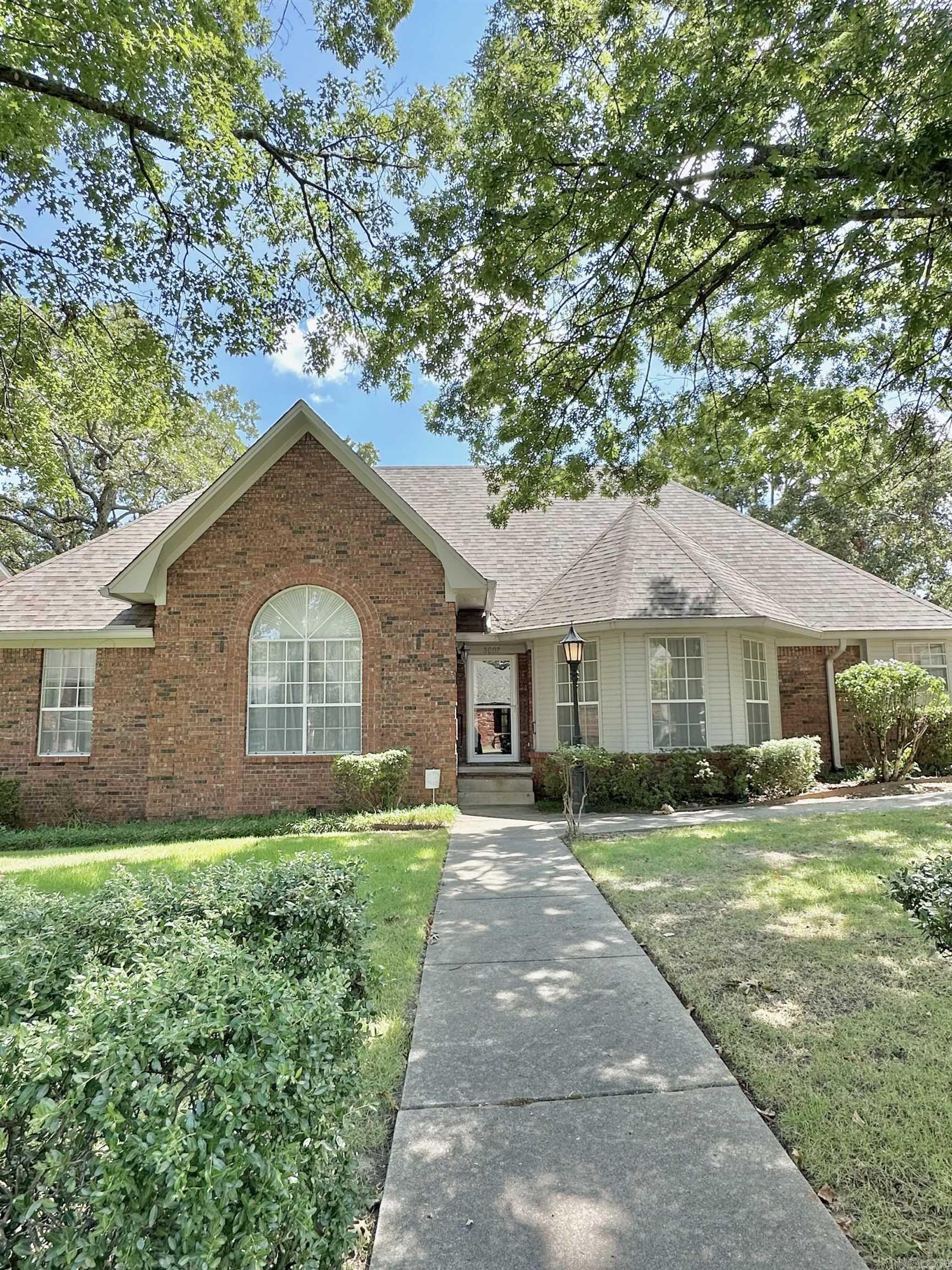 Very nice one level brick home in a lovely location. This one has everything you are looking for: *Remodeled large spacious kitchen with stainless appliances, granite counters, an island, a pantry, and a breakfast area. * Two living areas (den and living room) *Separate office with built ins. *Formal dining room. * Three bedrooms, two bathrooms. *Laundry room. *Fireplace *Nice garage with built in storage cabinets. *Attractive landscaping with sprinkler system. *Newer HVAC. *New water heater. *New roof with warranty. *Freshly painted interior. *Desirable sought after neighborhood.