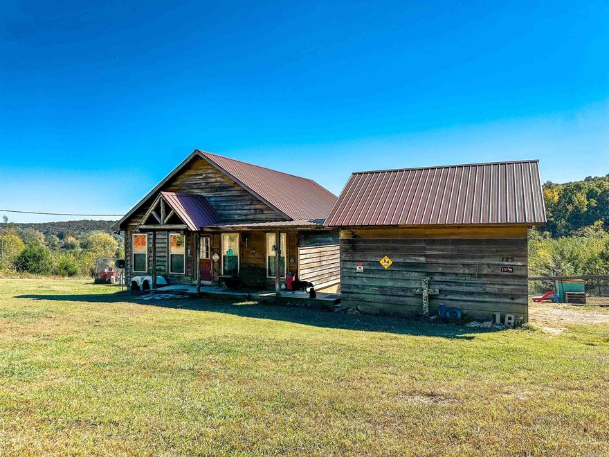 No. 25008: Welcome to your homesteaderās dream! This charming 2-bedroom, 2-bath cabin offers 1,280 sq. ft. of cozy comfort on 2.04 beautiful acres. Enjoy peaceful sunrises and sunsets from both the front and back porches while watching wildlife roam the property. Inside, red cedar ceilings, a loft, and a cozy fireplace create the perfect rustic retreat. The kitchen features live-edged countertops and a spacious walk-in pantry. The master bedroom includes a seated shower, while the second bedroom offers a generous walk-in closet and bathroom access from the bedroom. Laminate floors flow throughout, and additional storage closets provide plenty of space to stay organized. Outside, youāll find a fully fenced yard, detached carport with breezeway, separate garage, bays for animals, and a lovely garden area. Whether youāre looking for a peaceful getaway or a place to embrace country living, this property combines comfort, functionality, and natural beauty in perfect harmony. Priced at $229,000