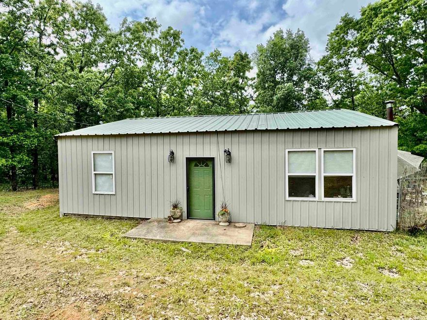 Cute 2Bd 1 1/2ba house with 6.50 acre of land. New luxury vinyl throughout, New Cabinets, dishwasher, Wood stove that's cool to the touch, entire house has been repainted. Home has a large laundry room, plus there is a pantry. New lighting fixtures. The home has 2 window units, wood stove, propane cook stove with two 100# bottles, Home has city water but still has a working well on the property. Septic tank is 1000 gal. The ductwork is already ran to have central heat and air installed. The property is also already fenced. There a storage building that's 12x16 but also has two covered spots. one spot big enough for a vehicle. Owner used to have horses here. This home is a must see!