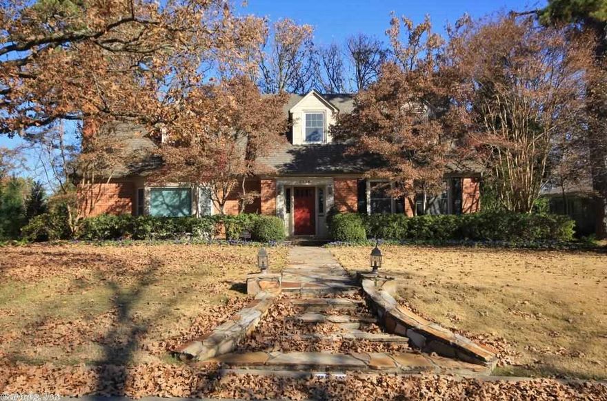 Inviting home in great neighborhood! Living rm w/expansive living space next to the Great Rm w/high barrel ceiling, wet bar & French doors to deck overlooking beautiful landscaped backyard w/lower terrace. Formal DR. Two fireplaces, one BR & BA main level. Master Suite & additional bedrm upstairs. Another bedrm, full bath & utility/laundry rm, storage, bonus rm on basement level along w/new garage (492 heat/cool not in listed sf).  New roof, windows, kitchen, and baths.  Come see!