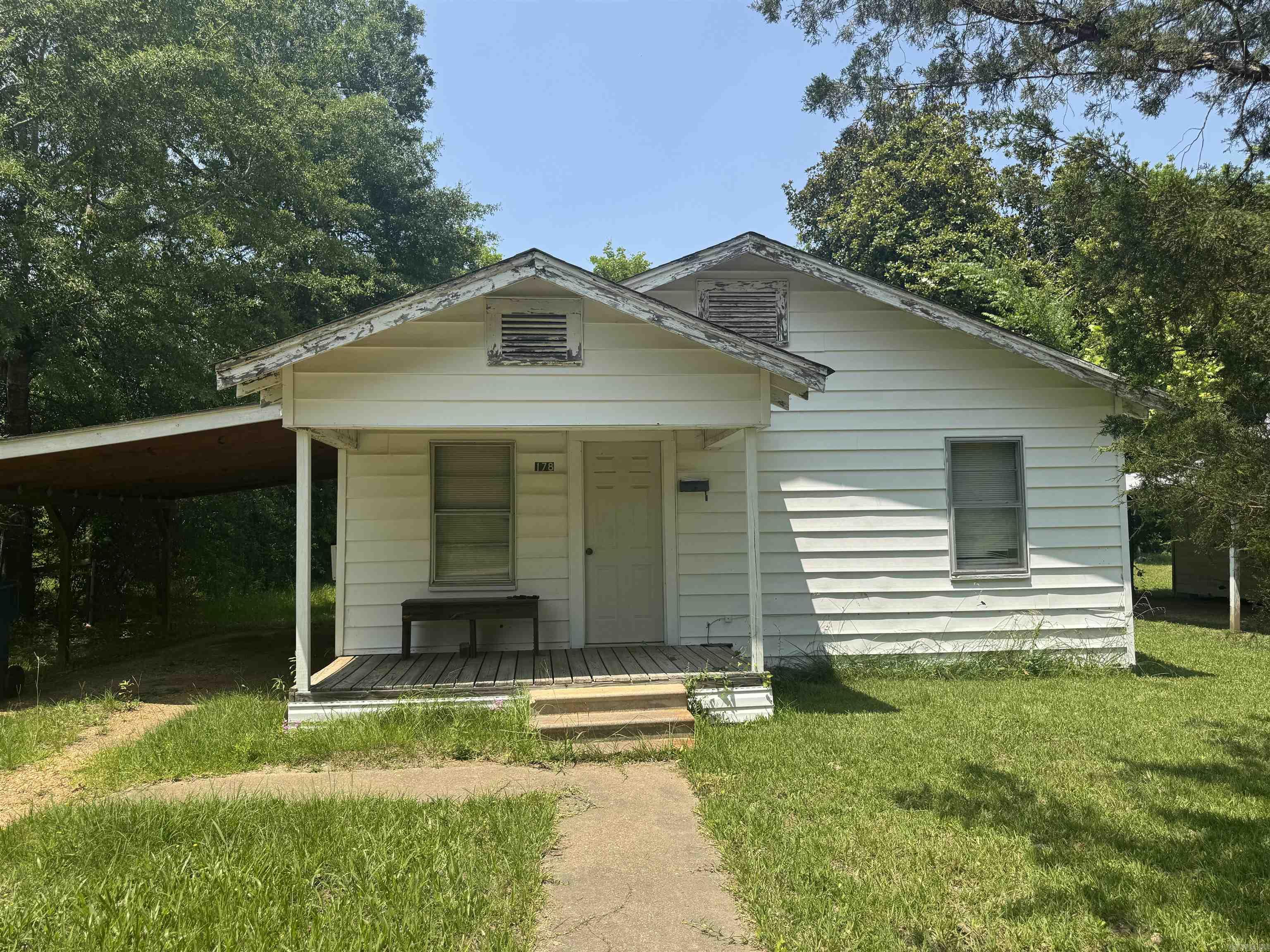 Start your real estate investing here! 2 bed 1 bath investment opportunity. Rent house ready! Full laundry hook up available, stove and fridge, covered attached parking. Low traffic area. No property disclosure available Acreage and sq footage taken from courthouse records