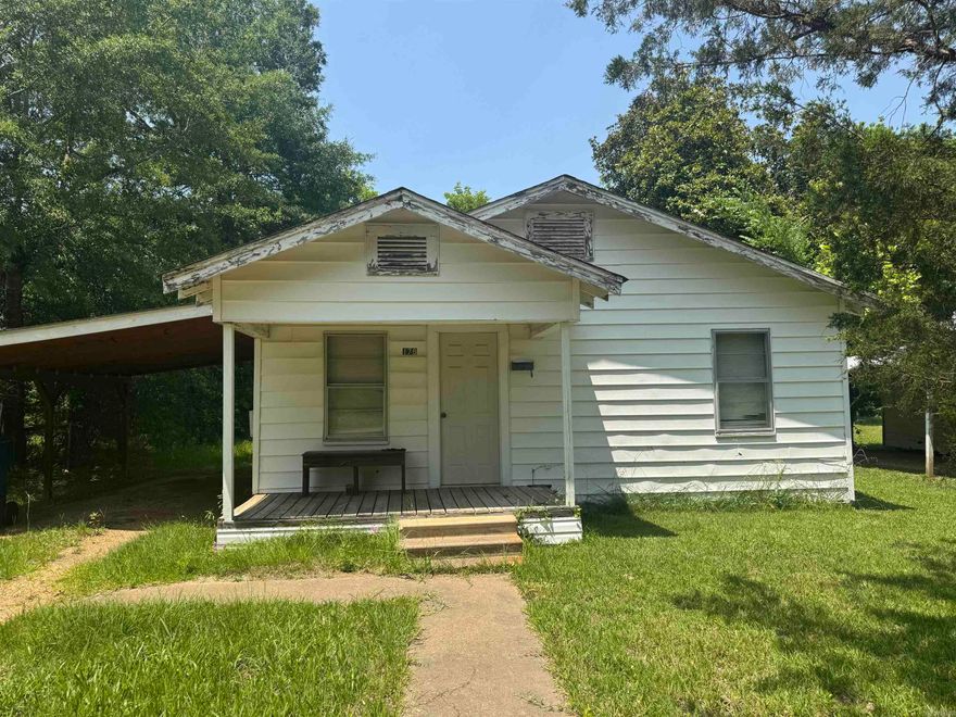 Start your real estate investing here! 2 bed 1 bath investment opportunity. Rent house ready! Full laundry hook up available, stove and fridge, covered attached parking. Low traffic area.   No property disclosure available Acreage and sq footage taken from courthouse records