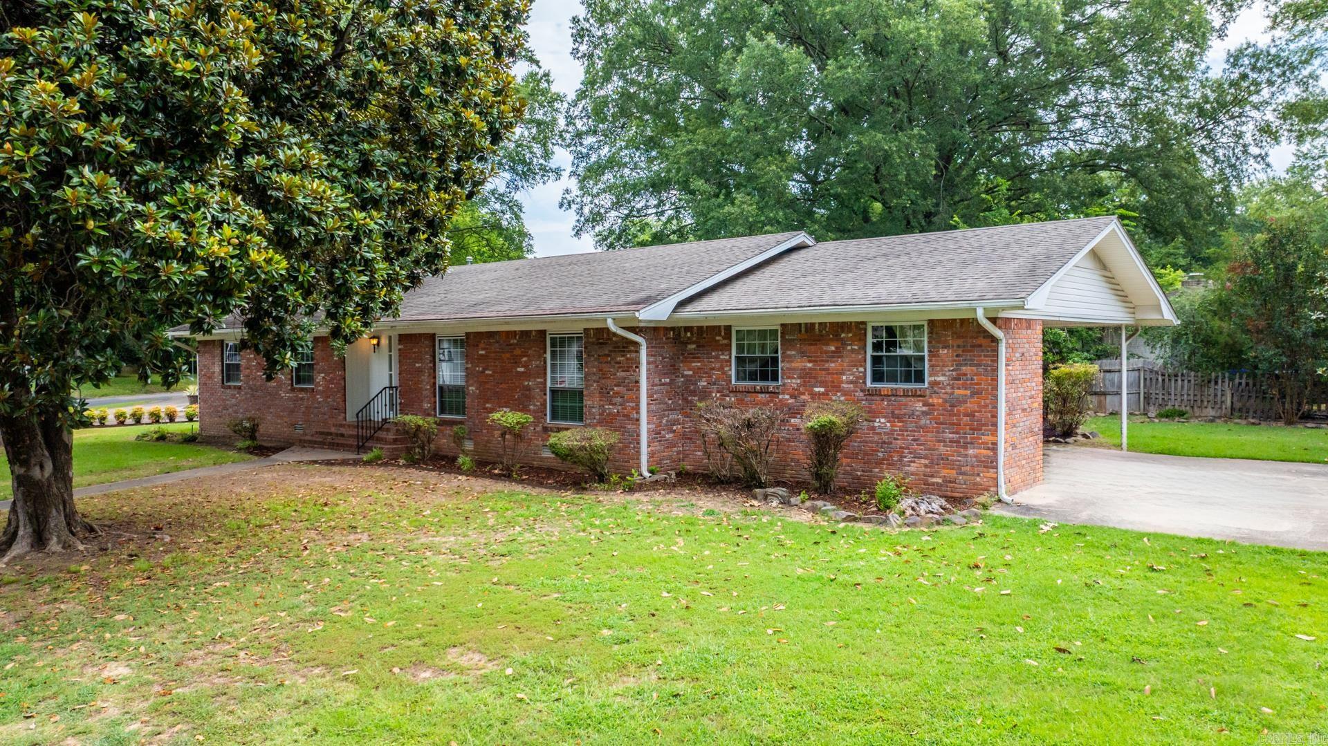 Very cute, well maintained home in an established neighborhood close to schools and shopping. Large corner lot. Two living areas, Oversized carport and tons of storage. Agents see remarks