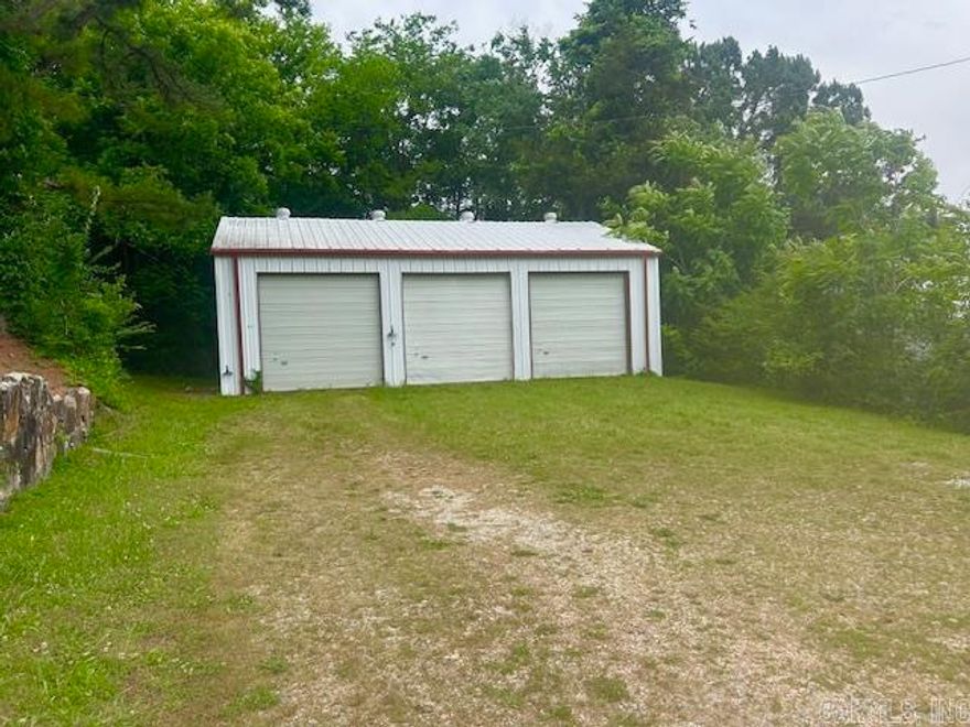 Great commercial space in the Heart of Mountain View Arkansas. This building is 1272 sq ft. and has 3 bay doors. There is power, water and City Sewer already on site. This shop has 2 bathrooms one is in working order the other just needs a toilet. If you're looking for a commercial spot in downtown Mountain View or just a place to store all your things this could be an affordable option.