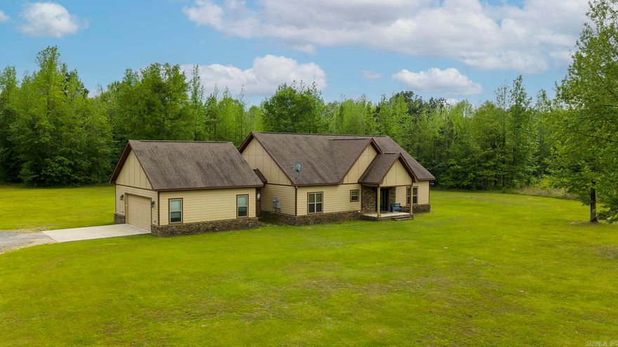 Custom-built home situated on 8 beautiful acres in the desirable Chapel Creek subdivision within the Harmony Grove area. This property offers the perfect blend of neighborhood living with a private, country feel. Inside, you’ll find vaulted ceilings and a massive open floor plan designed for gathering and entertaining, complete with a gas log fireplace in the living room. Floor-to-ceiling windows across the back of the home showcase peaceful views and natural surroundings, bringing in an abundance of light. The split floor plan provides ideal privacy, with a spacious primary suite featuring two walk-in closets and an oversized walk-in shower. Additional rooms offer 10-foot ceilings, adding to the home’s open and airy feel throughout. The spacious double garage includes a fully floored attic, providing excellent storage space.