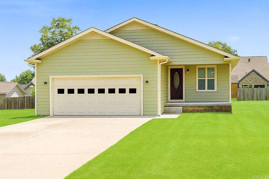 Located in the welcoming small town of Marmaduke, this home offers low-maintenance Hardie Board siding, a new roof installed in August 2023, and HVAC updates completed in July 2025. Inside, the open-concept layout connects the living, kitchen, and dining areas, creating an inviting space for cooking, entertaining, or simply staying connected. The kitchen island provides generous workspace and doubles as a convenient breakfast bar.  The spacious bedrooms include a primary suite with a tray ceiling, walk-in closet, and double vanity. Additional highlights include hardwood floors, wood-look tile in the bathrooms, and a large yard perfect for pets or outdoor activities. The lot also offers the potential for a future split, an appealing option for selling as an additional lot or starting a spec house project.