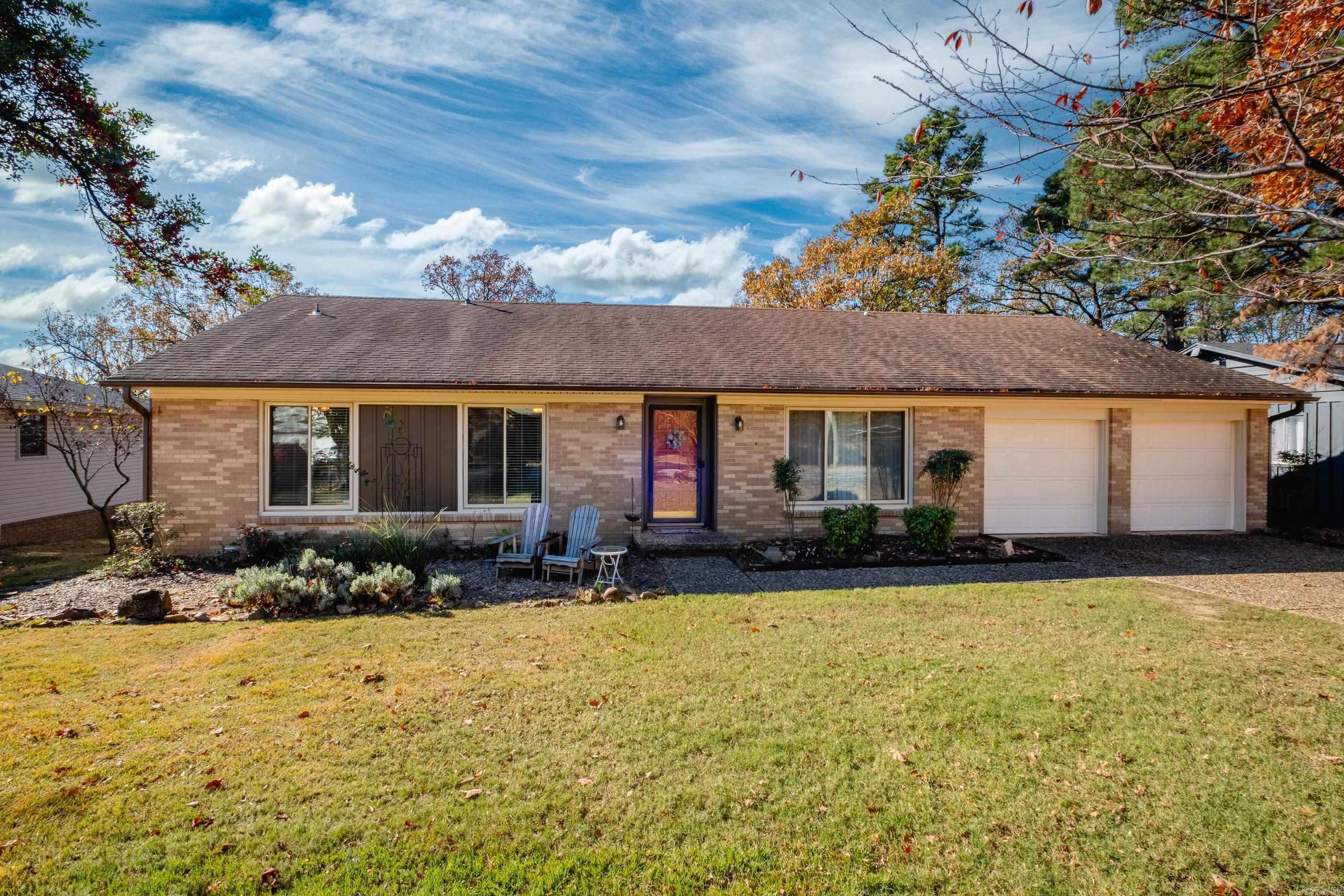 Charming one level with updates and scenic views. This light-filled, well-maintained home offers spacious living, a flexible dining room/office, and a cozy family room with a wood-burning fireplace with gas starter. Recent updates include a 2012 roof, 2019 tankless water heater, new bedroom carpet, LVP flooring, fresh paint, and a renovated kitchen (2021) featuring butcher block counters, updated cabinets, lovely backsplash, large sink, and paint. Relax on the expansive newer deck overlooking a beautifully landscaped yard with stunning vista views. Large laundry room and storage. Zoned for Don Roberts Elementary. Comfortable, convenient, and move-in ready. Come See!