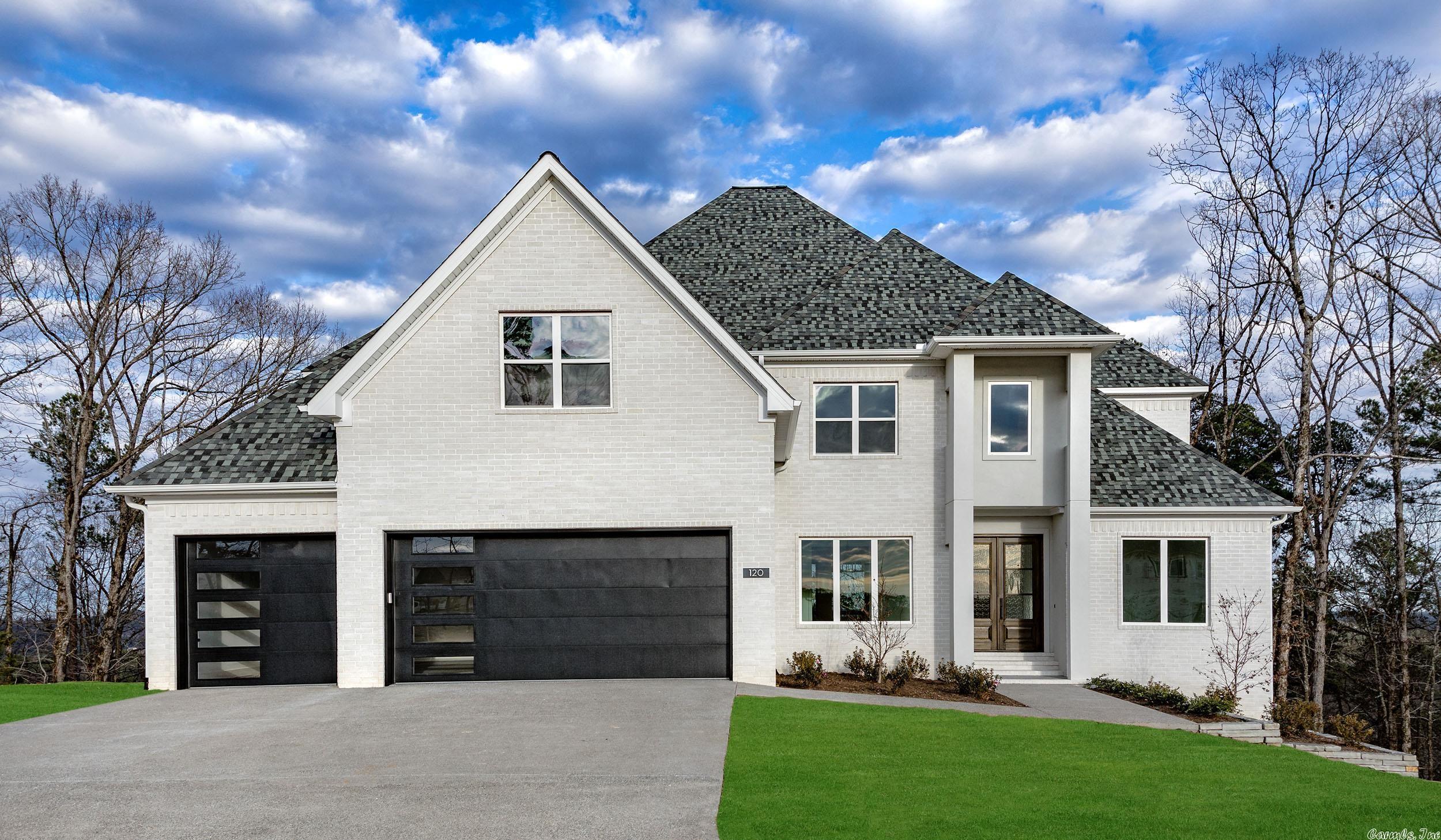 Amazing new construction in Chenal Valley's Falstone Court neighborhood. Vaulted Great Room with beautiful windows overlooking the wooded greenbelt. Special details include the coffered ceilings, composite decking, built in bookcases, double shower in Primary Suite, oversized rooms and so much more. Nice cul de sac location at the end of Falstone Drive. Landscaping and flooring going in now. Estimated completing November/December.